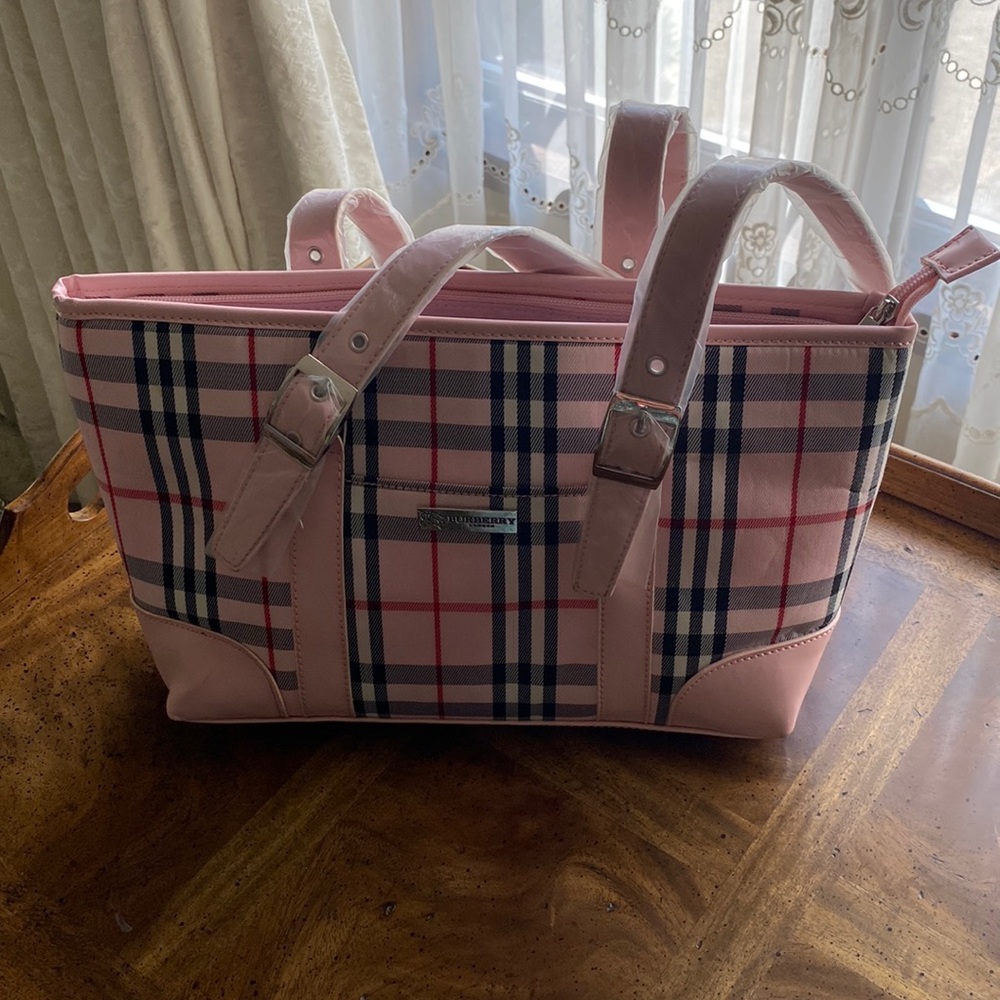 Burberry bag I got last year, but never used it because it’s just not me!